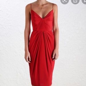 Knee length. Light silk fabric. Zimmerman size 2 which is Medium size 6 or 8.